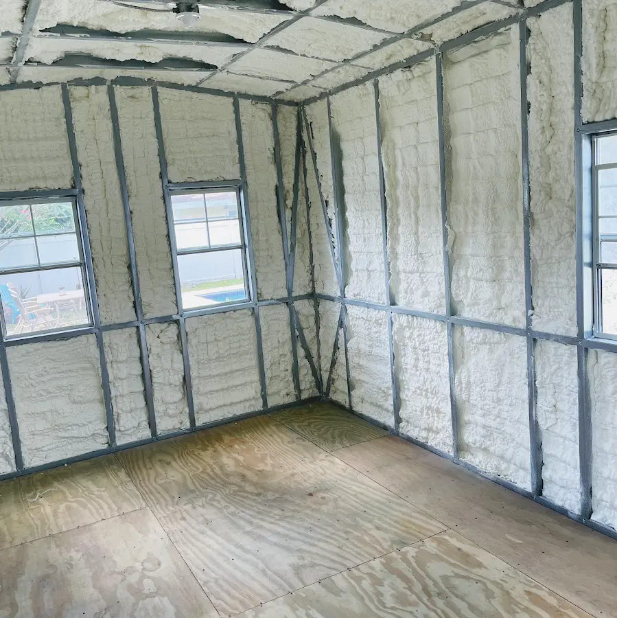 Closed-cell spray foam insulation applied to wall cavities in a residential project in Marina